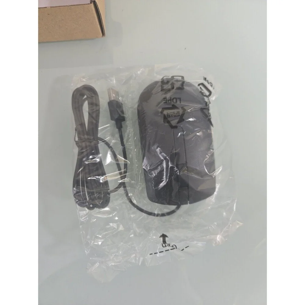 This is a standard, 3-button USB mouse designed for everyday computer use...